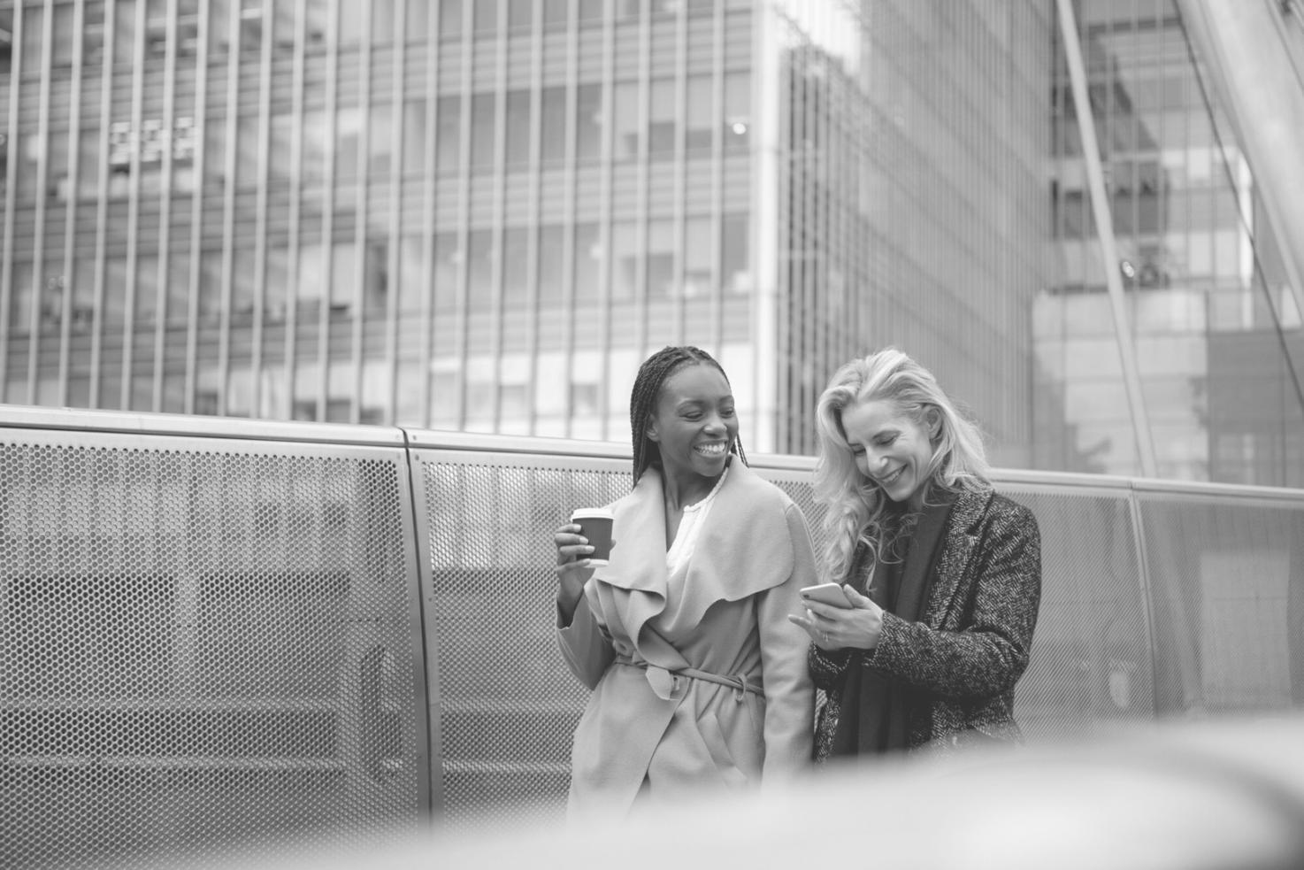 Entrepreneurs collaborating on business strategy and financial planning in modern workspace